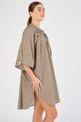 Profile view of model wearing the Oroton Gingham Print Kaftan in Chocolate and 100% cotton for Women