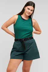 Profile view of model wearing the Oroton Lottie Rib Tank in Villa Green and 92% Cotton / 8% Spandex for Women