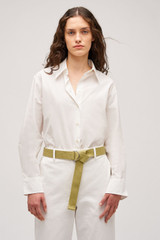 Profile view of model wearing the Oroton Wren Poplin Shirt in Antique White and Made from 100% poplin cotton for Women