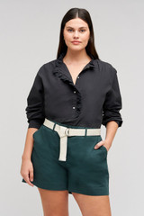 Profile view of model wearing the  Alfie Carpenter Short in  and Crafted from cotton twill  for Men