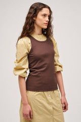 Profile view of model wearing the Oroton Lottie Rib Tank in Chocolate and 92% Cotton / 8% Spandex for Women