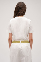 Profile view of model wearing the  Maggie Classic Tee in  and Made from 100% cotton for Men