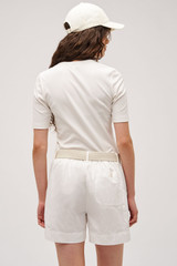 Profile view of model wearing the  Margot Rib Henley in Antique White and 92% Cotton / 8% Spandex for Men