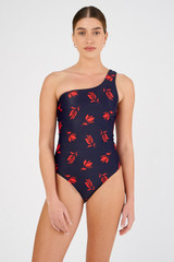 Profile view of model wearing the Oroton Dutch Tulip Asymmetric One Piece in North Sea and 78% polyamide, 22% elastane for Women