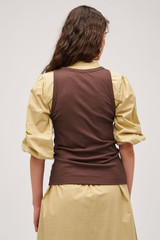 Profile view of model wearing the Oroton Lottie Rib Tank in Chocolate and 92% Cotton / 8% Spandex for Women